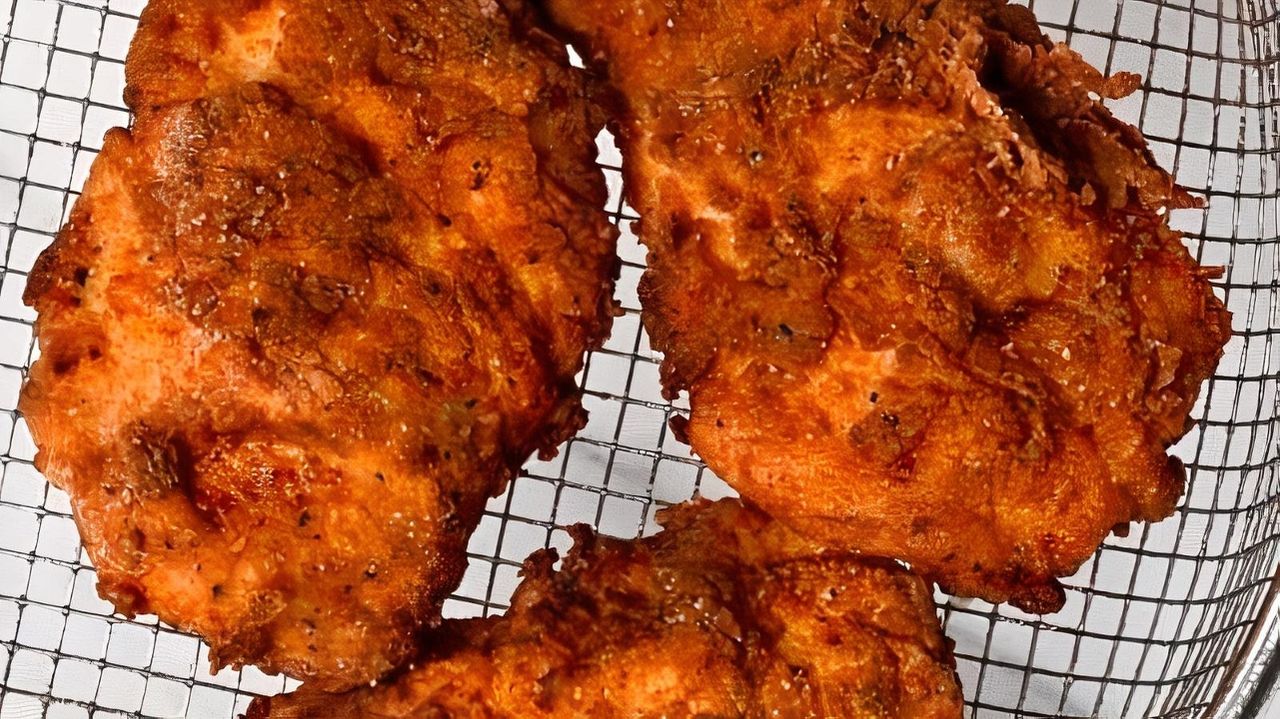 Three pieces of Carolina Kitchen fried chicken in a basket